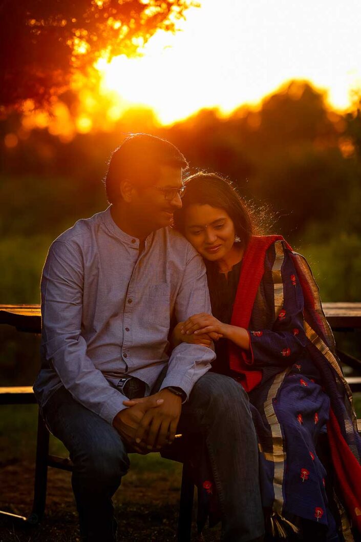 Naperville family photographer couple sitting park