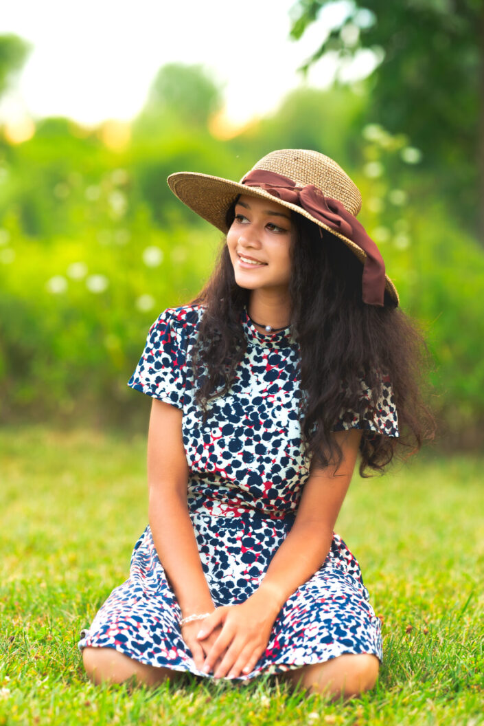 senior-girl-sitting-park