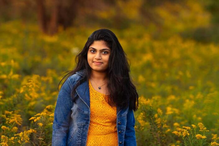 Naperville family photographer girl yellow flower jacket blue sunset